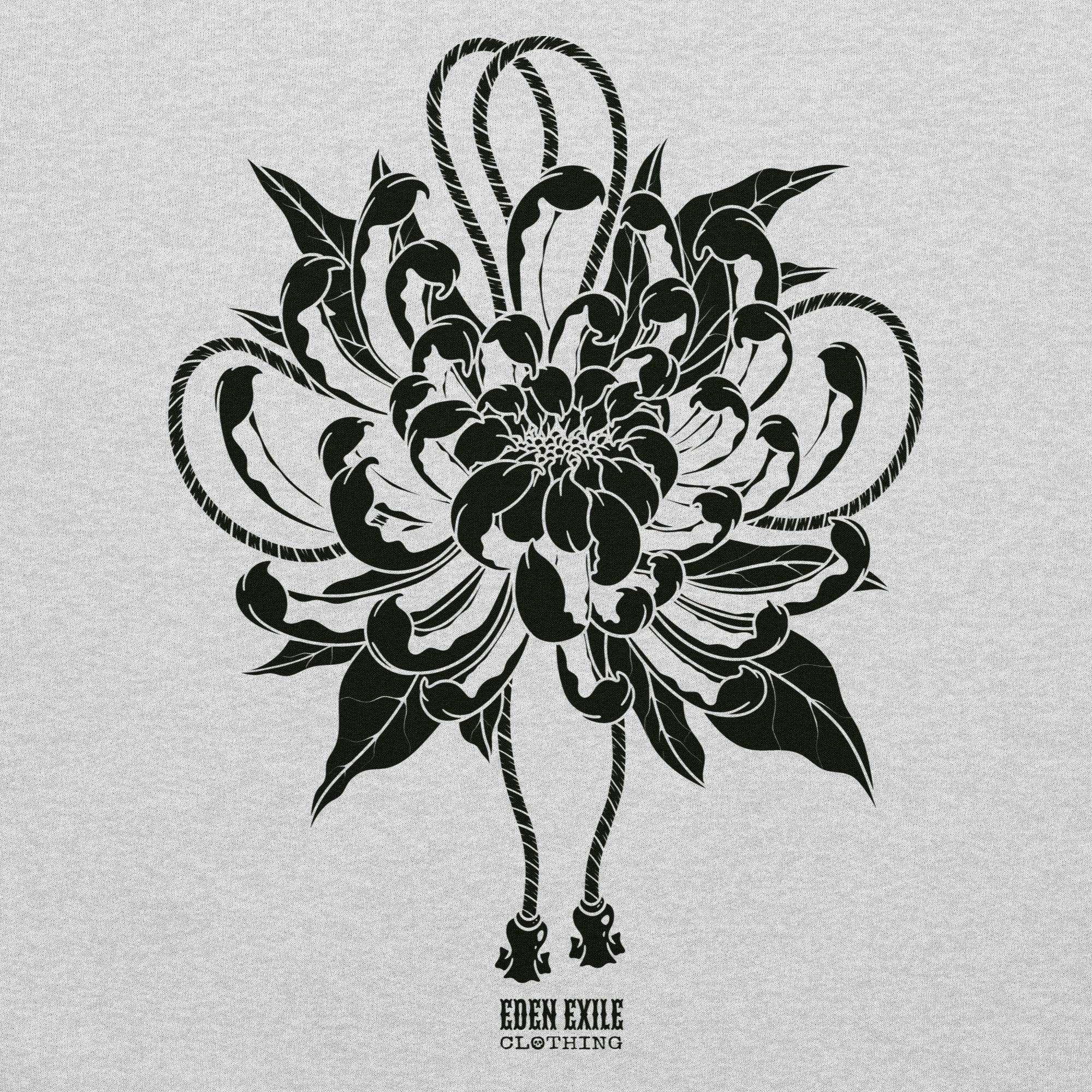 Black chrysanthemum flower design in tattoo style on a light gray background with 'Eden Exile Clothing' branding.