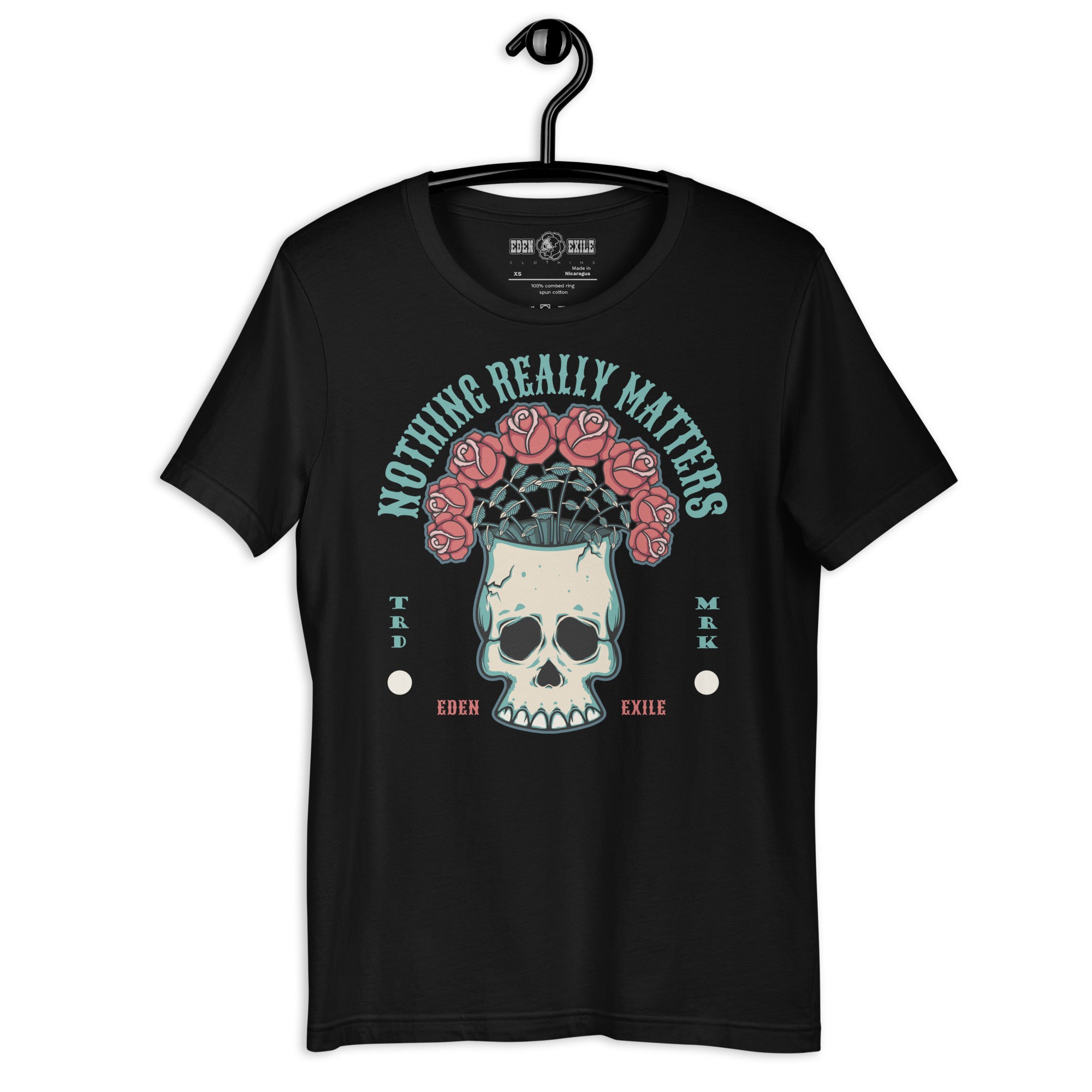 Black t-shirt with skull and roses design on a hanger