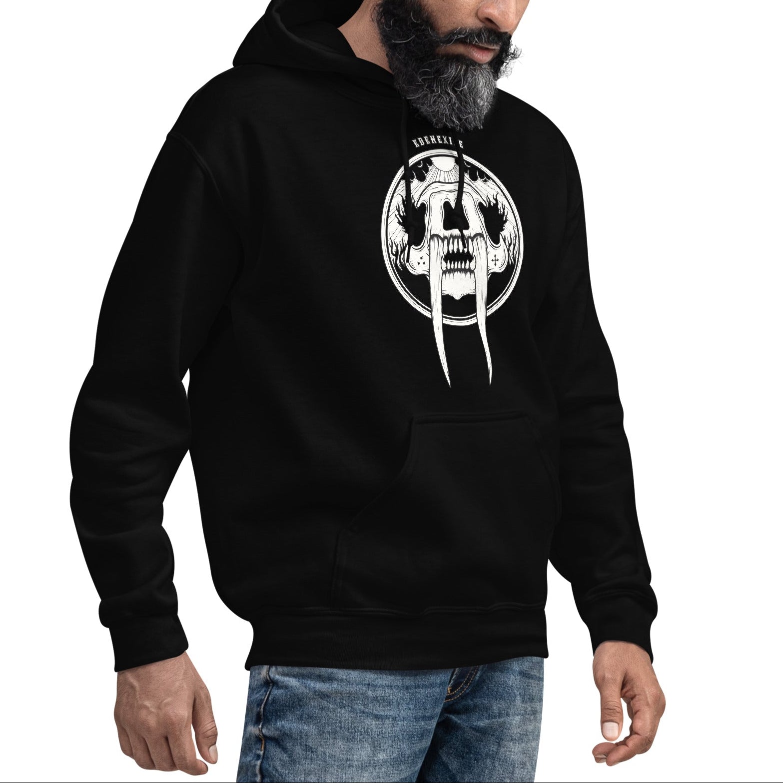Man wearing a black hoodie with an intricate hand drawn sabretooth skull design on a white background