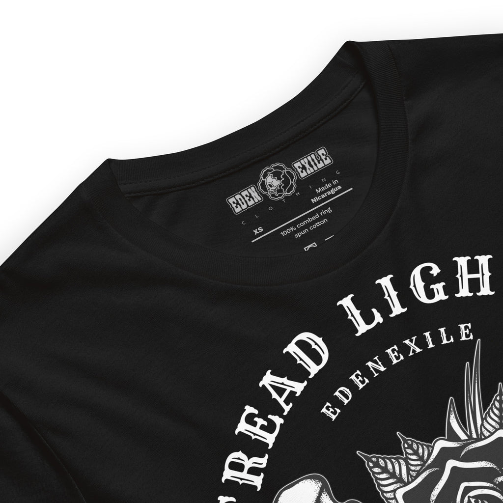 Black t-shirt with text "tread lightly" and a black rose design graphics, featuring 'Eden Exile' branding.