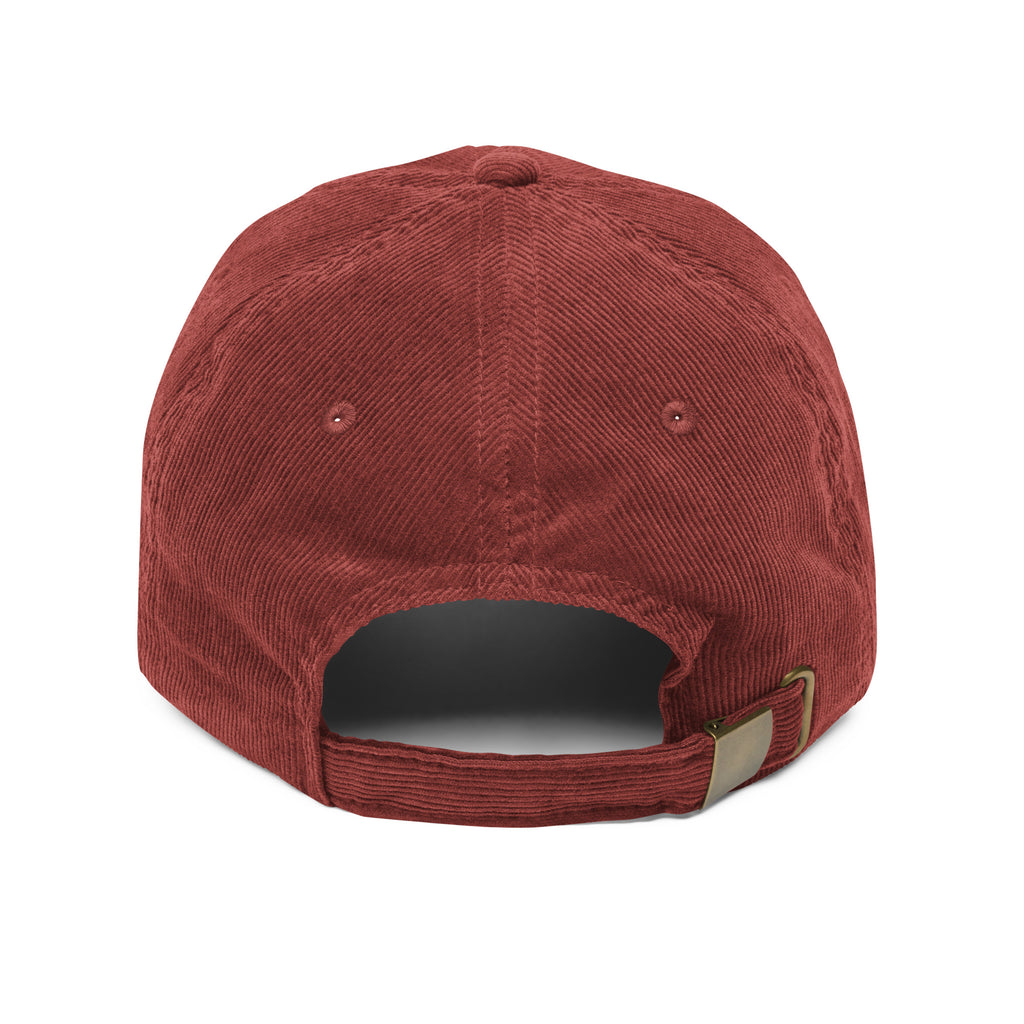 Red cap with a gold buckle on a white background