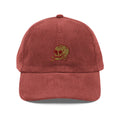 Red cap with a skull and crossbones design on a white background