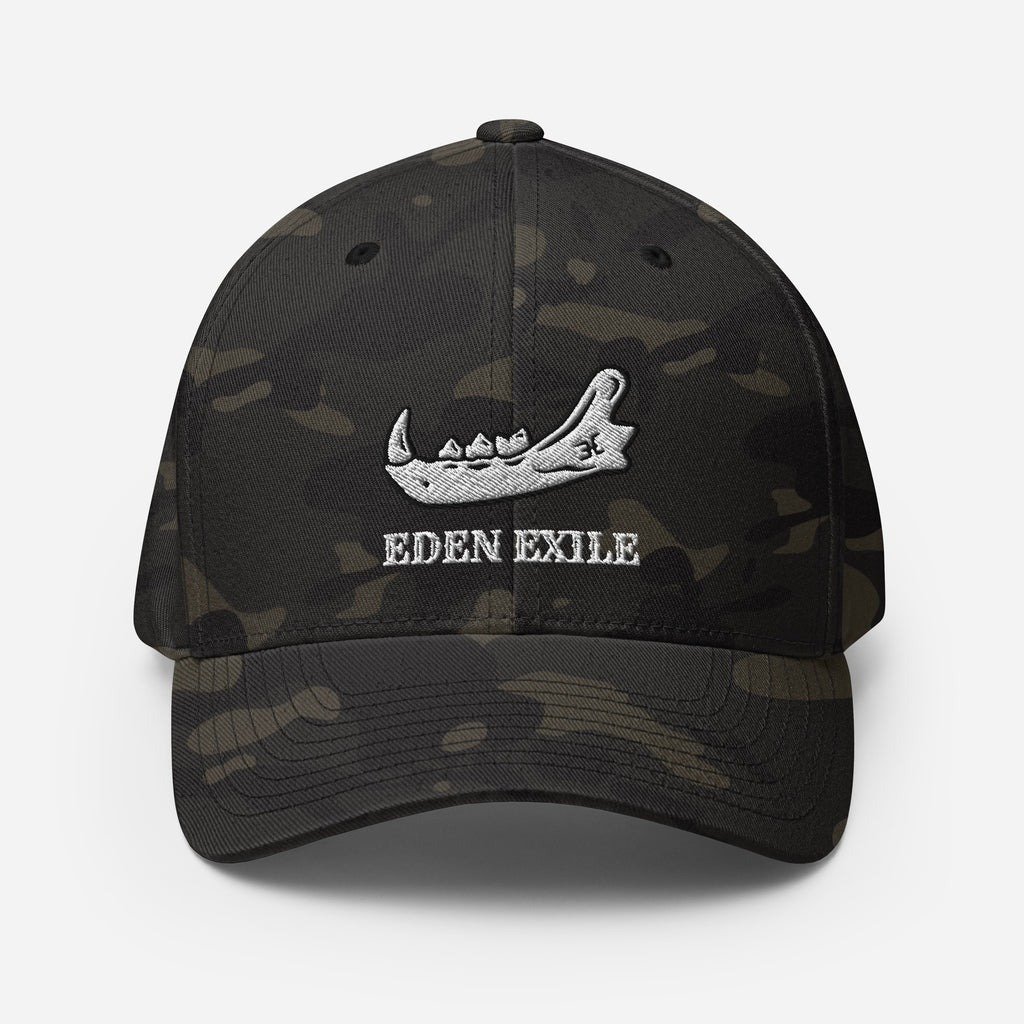Camouflage baseball cap with a voodoo jaw graphic design and 'Eden Exile' on a white background