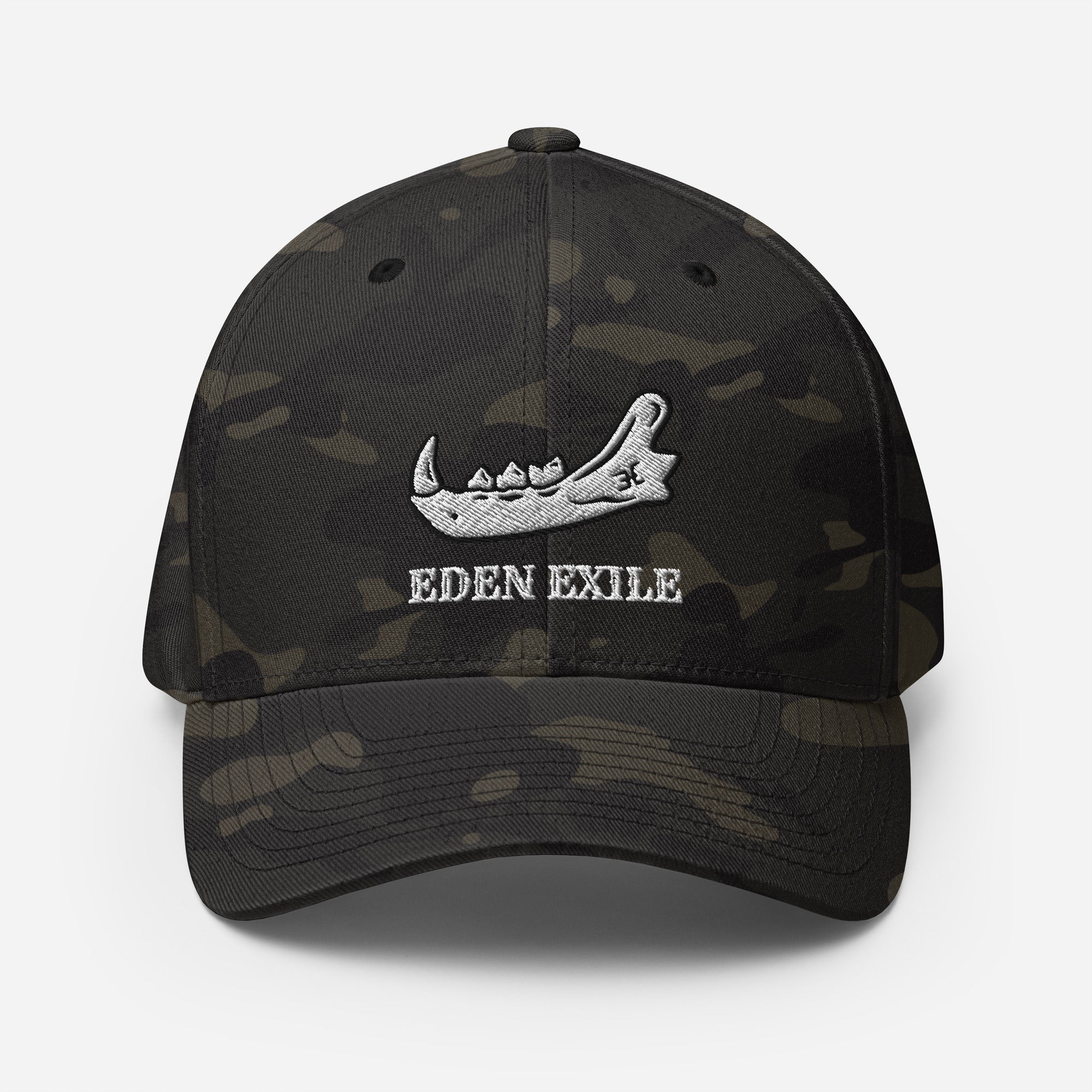 Camouflage baseball cap with a voodoo jaw graphic design and 'Eden Exile' on a white background