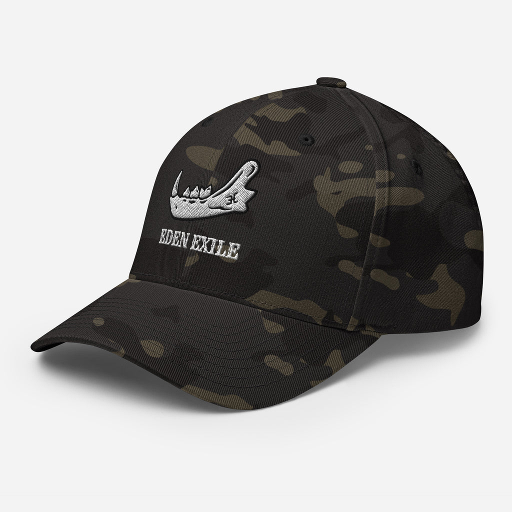Camouflage baseball cap with 'Eden Exile' written under an animal JAW tattoo design on a white background