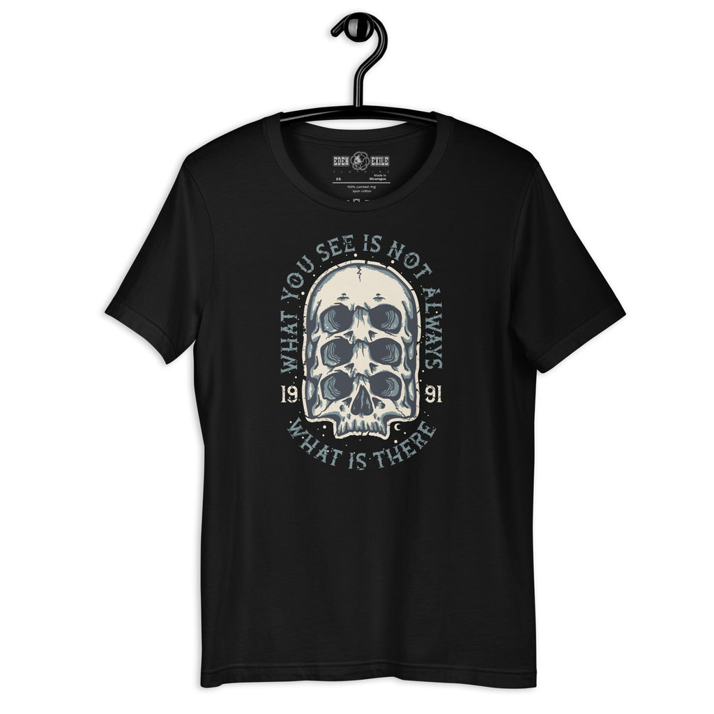 Black t-shirt with a white srreal  skeleton design on a hanger against a white background