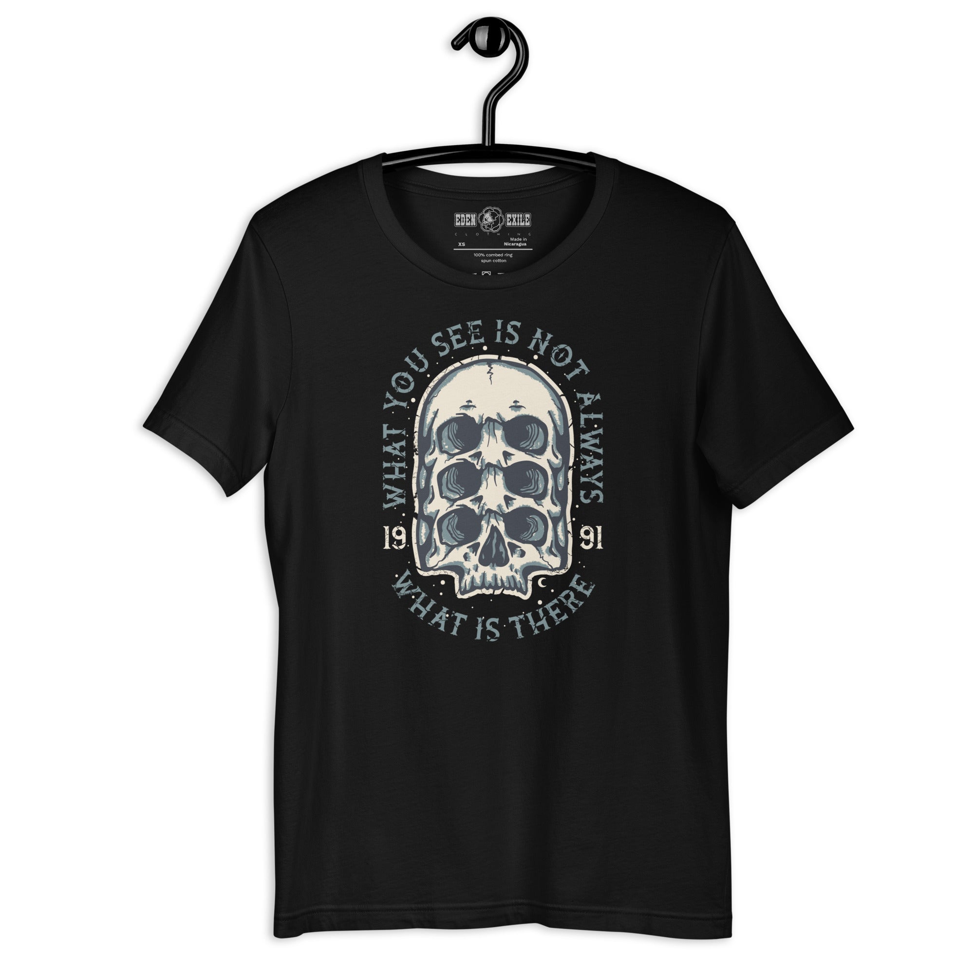 Black t-shirt with a white srreal  skeleton design on a hanger against a white background